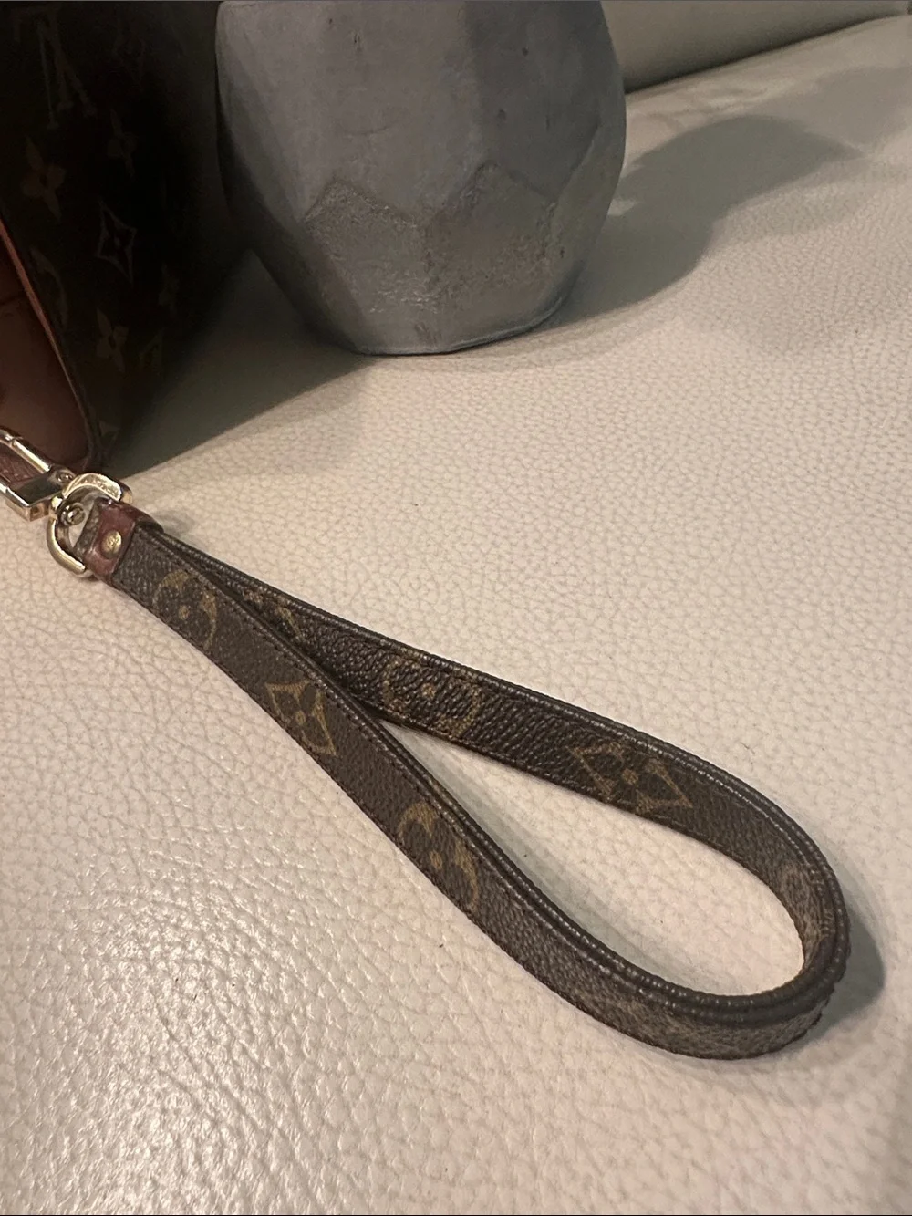 Louis Vuitton Monogram Canvas Wristlet in Brown and Gold